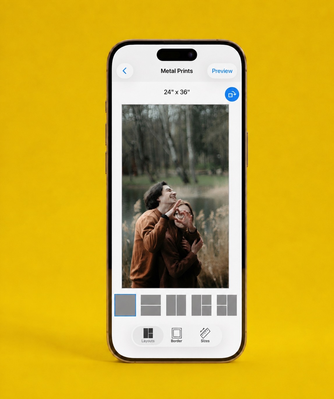 The SimplePrints app on a phone, previewing a couple’s photo as a metal print
