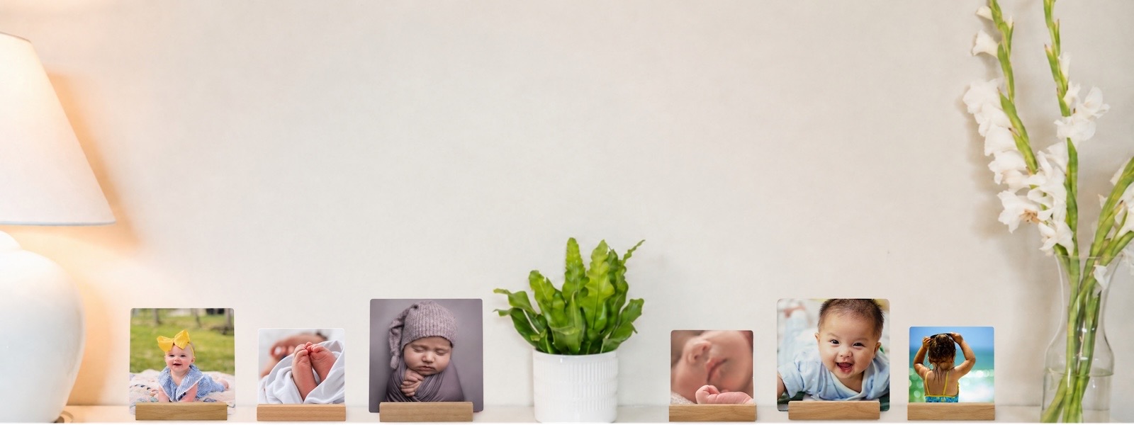 SimplePrints baby desk prints displayed at both sizes on a shelf