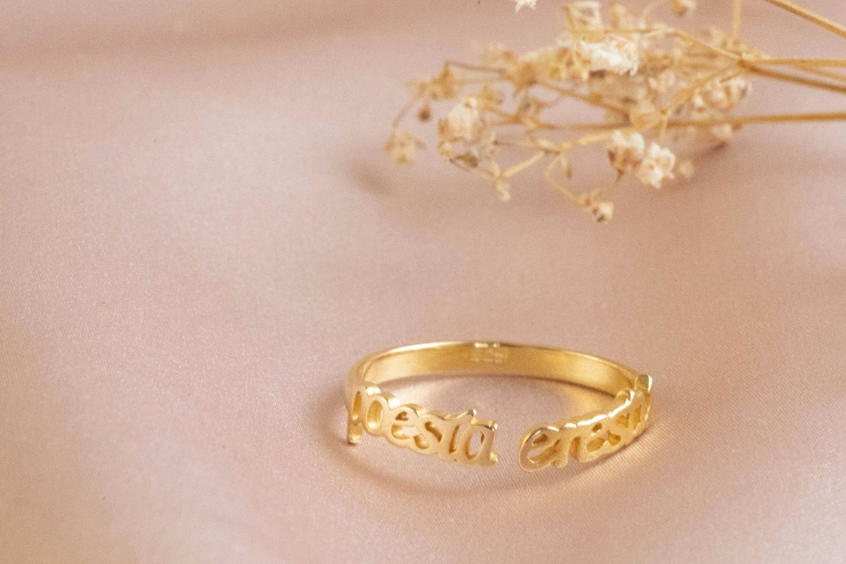 a custom ring engraved with a saying in a foreign language.