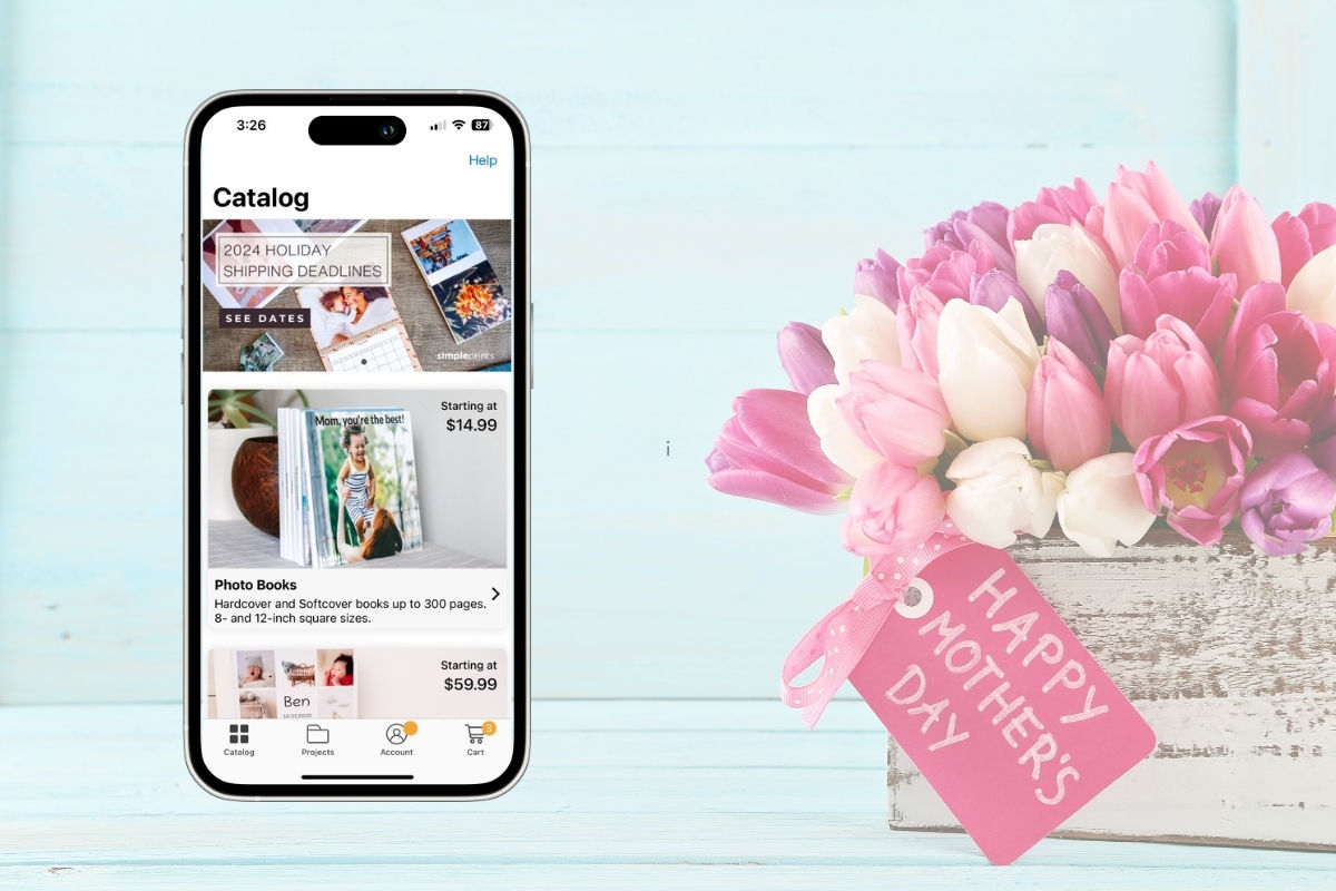 The Simpleprints app on a phone with flowers and it says Happy Mother's Day!