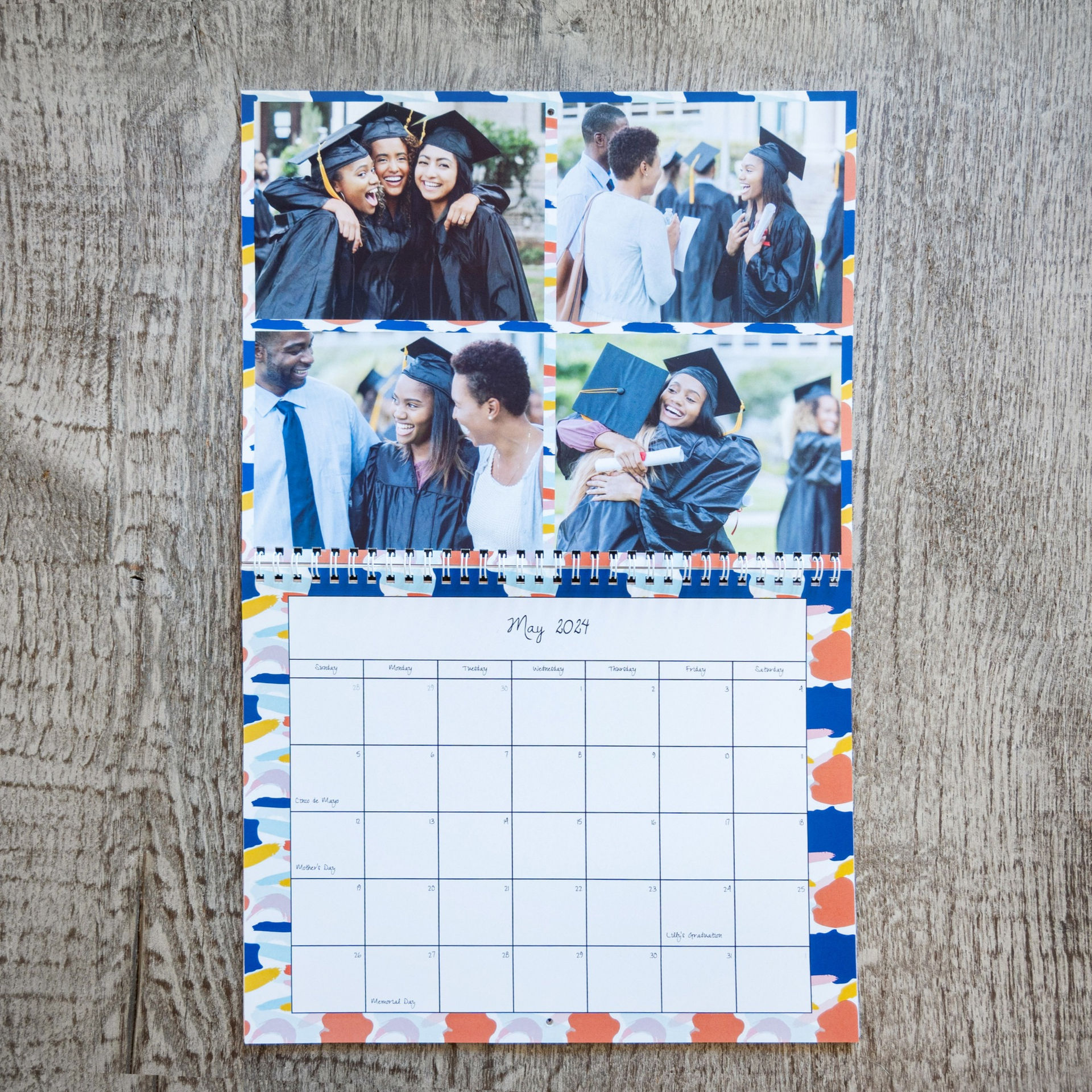A wall Calendar with Graduation photos for the month a may