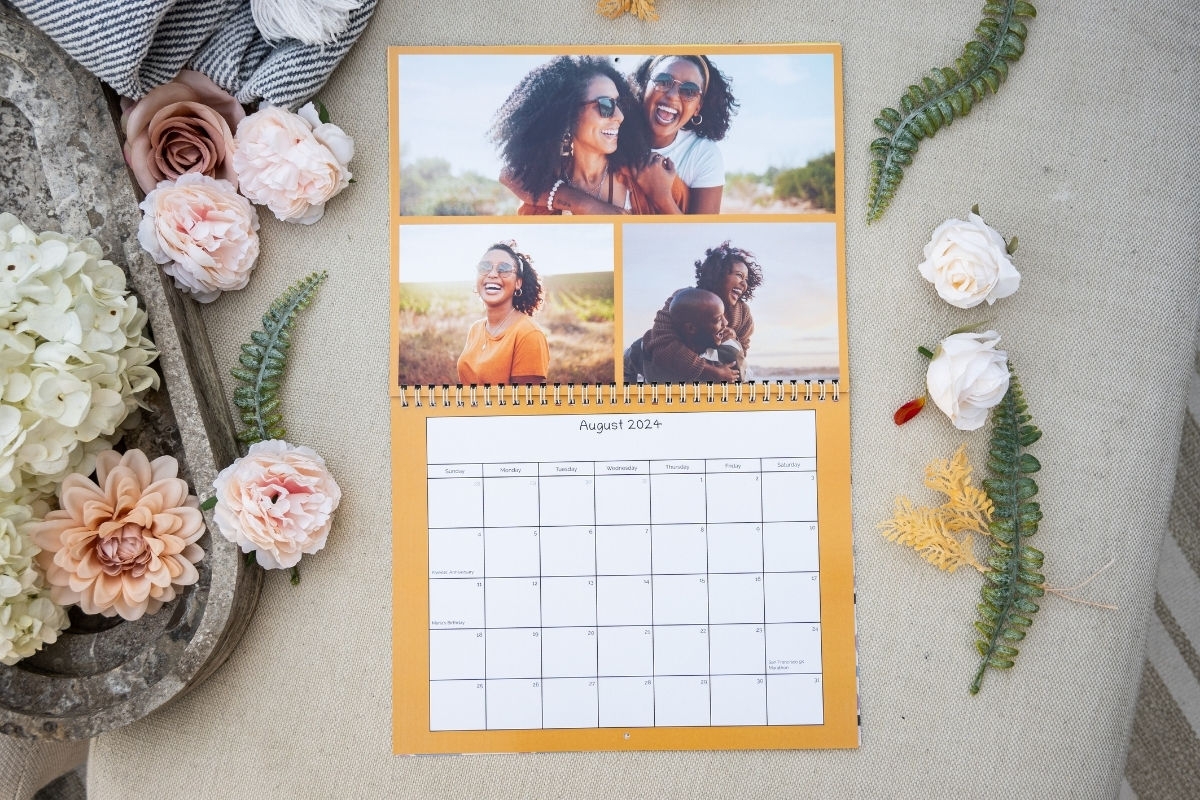 A custom calendar with family photos of a mom, dad and teenage daughter