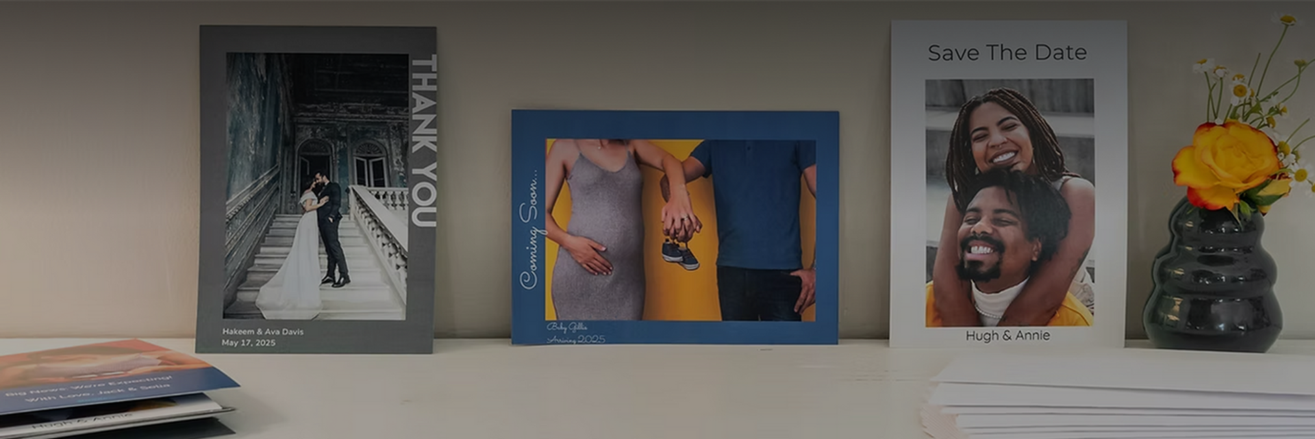 Various photo cards leaning against a wall