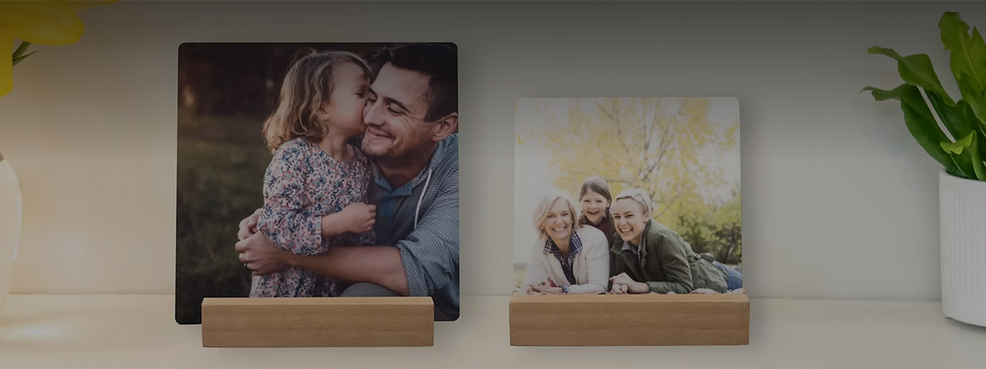 Two metal desk prints on a desk