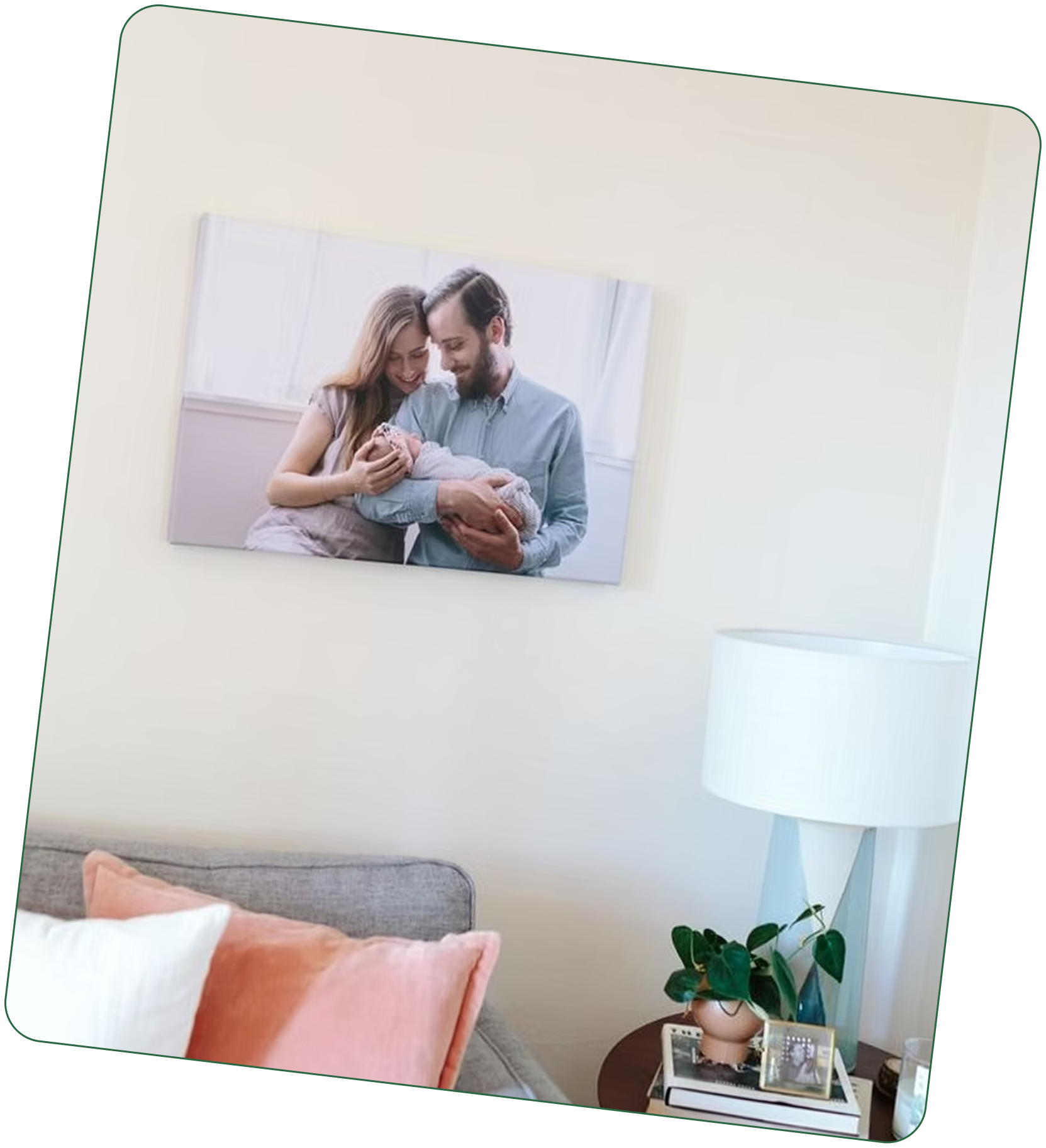 A canvas print of new parents holding their baby