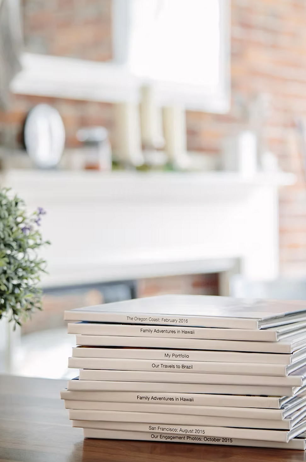 Photo of a stack of photo books on a table