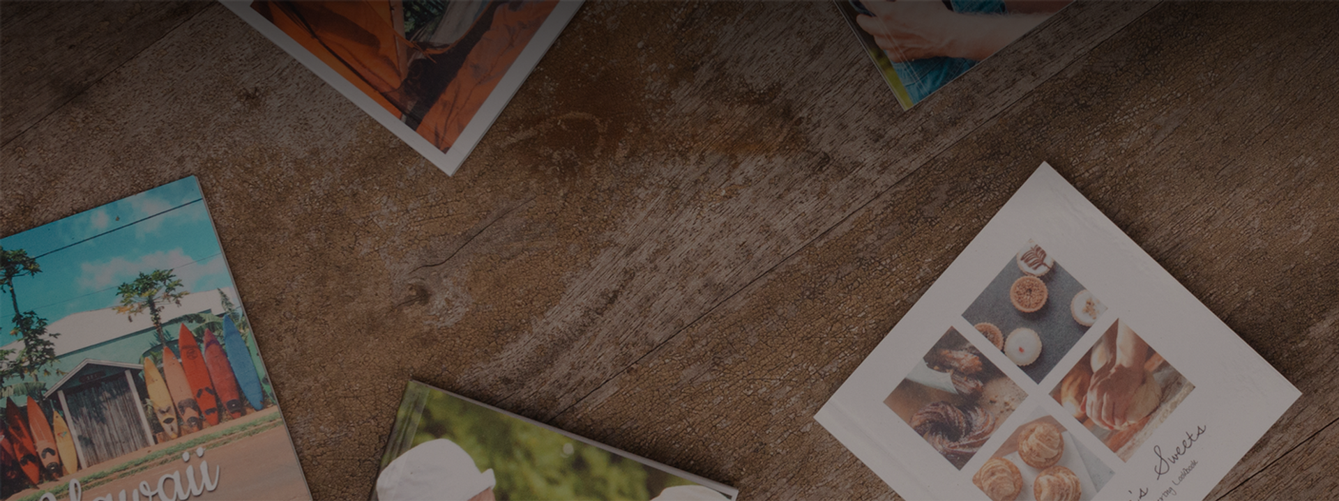 Mini photo books laid out on a table