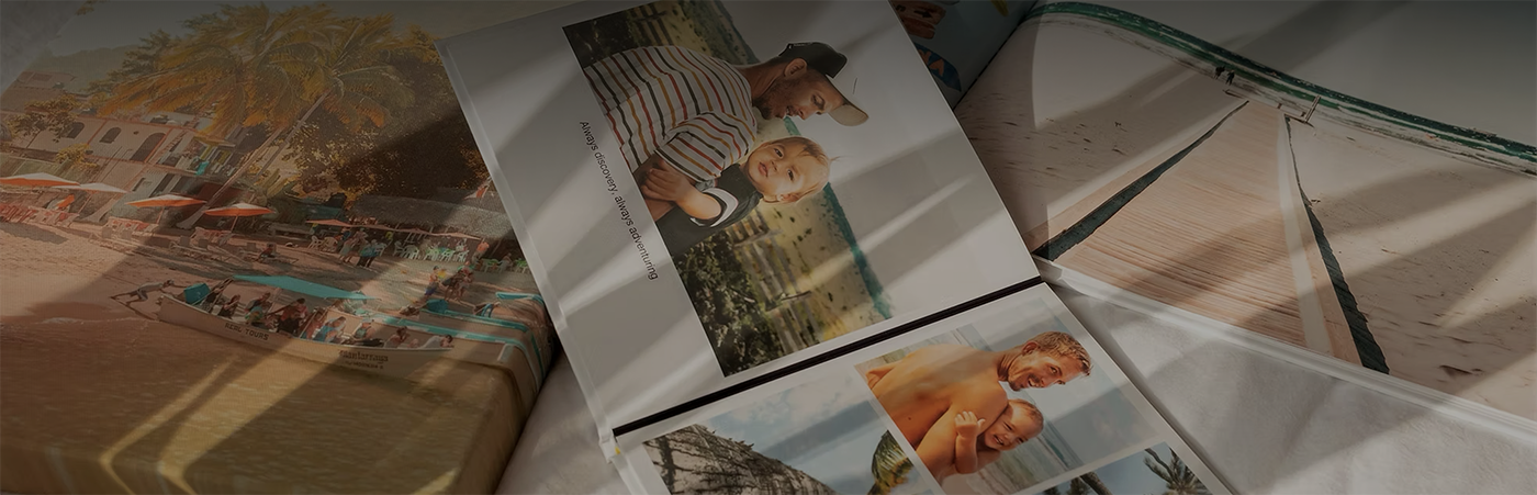 Photo of Canvas print and photo book laid open