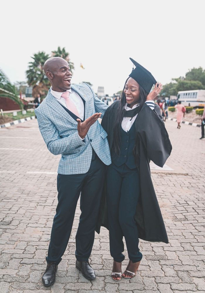A graduation photo book, held up