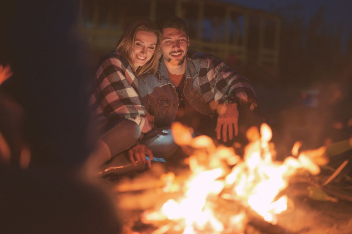 Couple enjoying a firepit