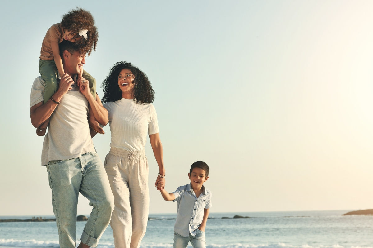 Family walking on the beach
