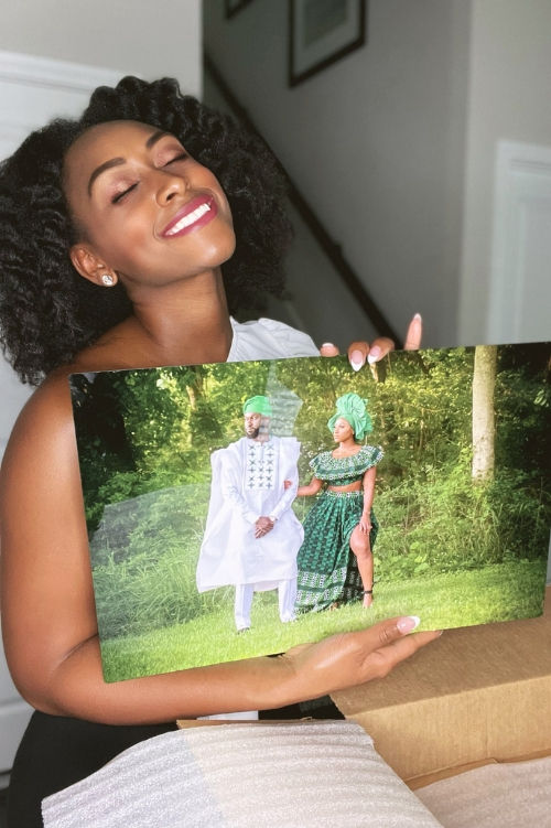 Woman holding a SimplePrints metal print