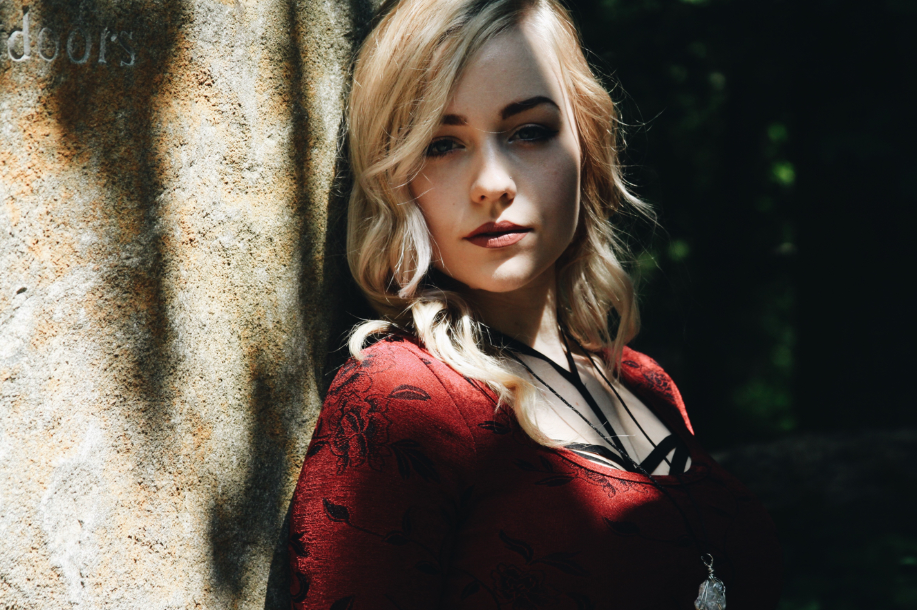 One summer photography tip is to find, a shady spot for people to gather. A lightly shaded spot can help eliminate funky shadows and squinty eyes.