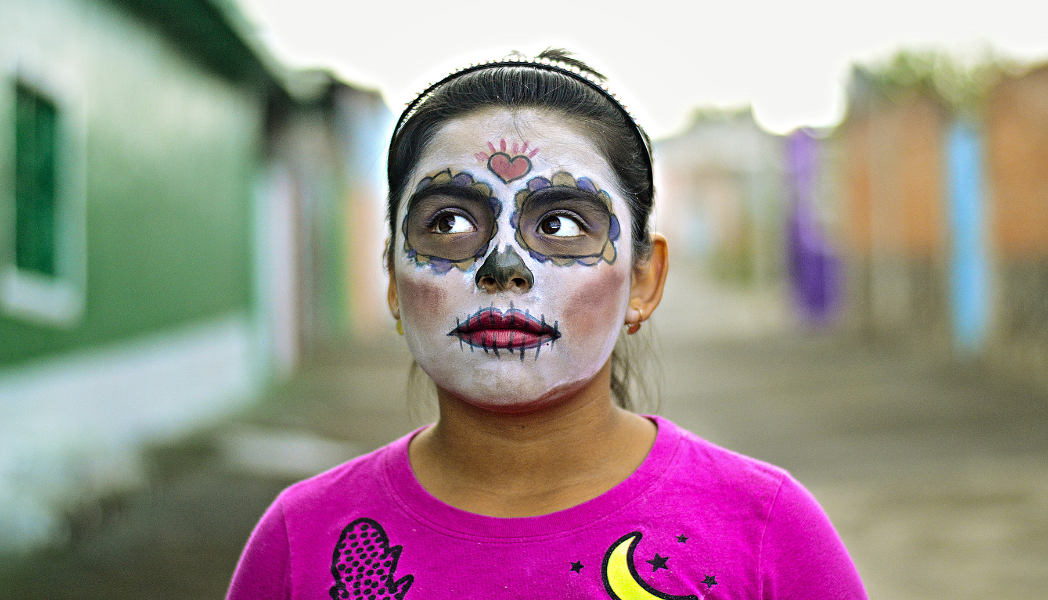 Skull makeup for Halloween. Capture Halloween memories and get them printed on SimplePrints app.